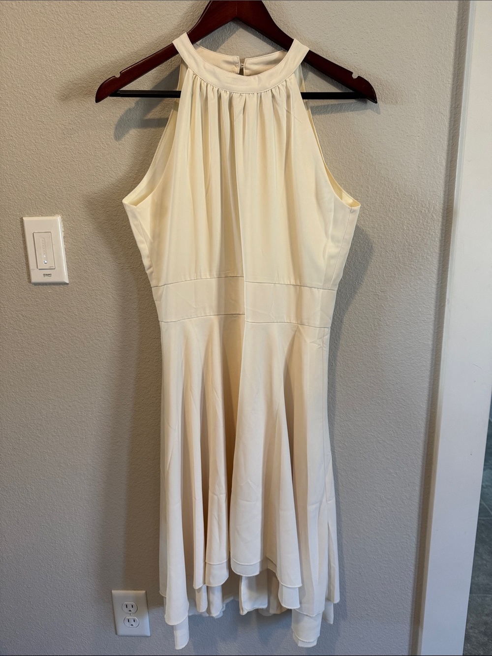 Sleeveless High-Low High Neck Dress in Cream